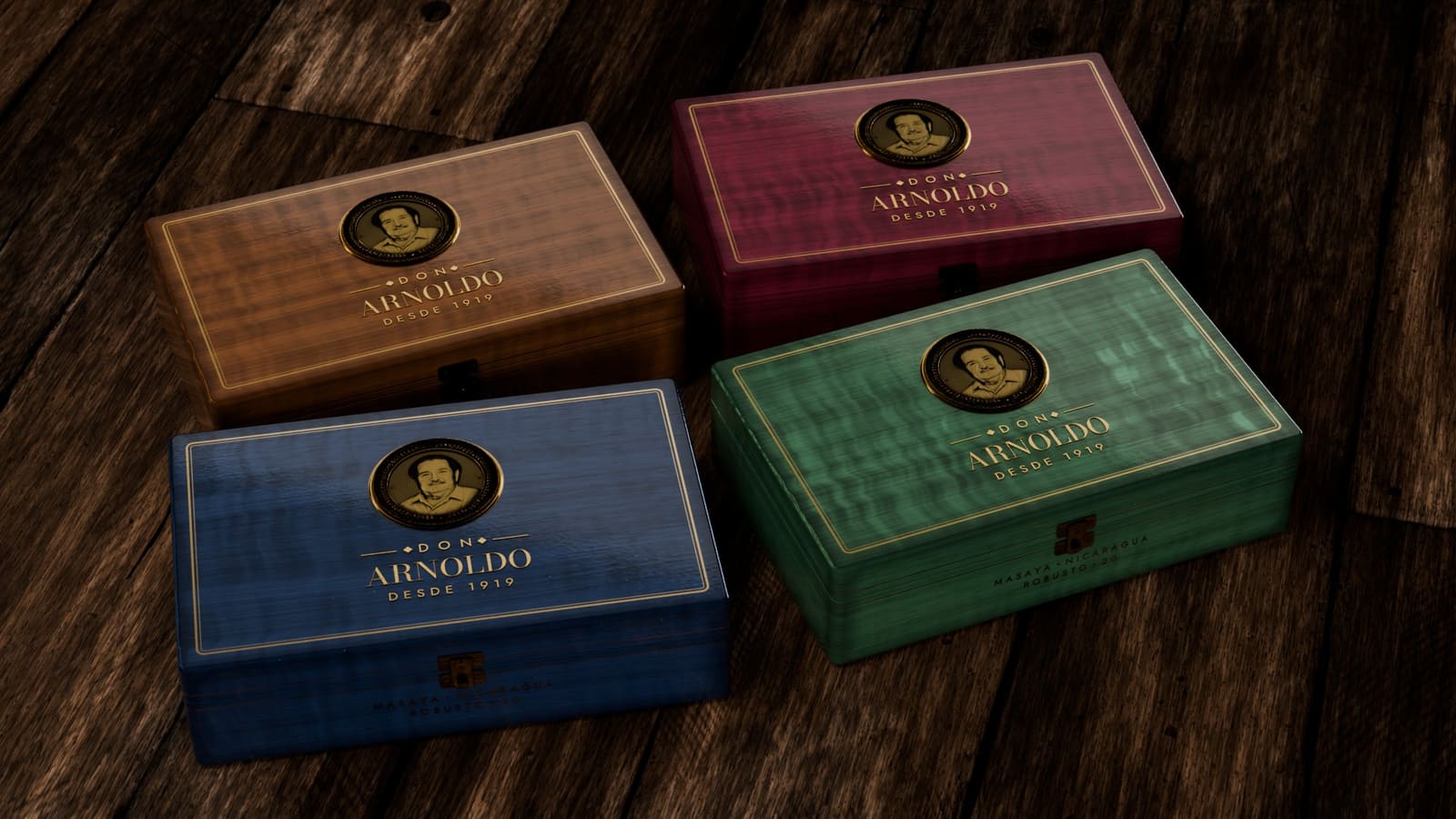Cuatro cajas cerradas, una de cada color: Tabaco, Vino, Azul Noche y Verde Masaya, cada una con la medalla dorada y el nombre en la tapa.